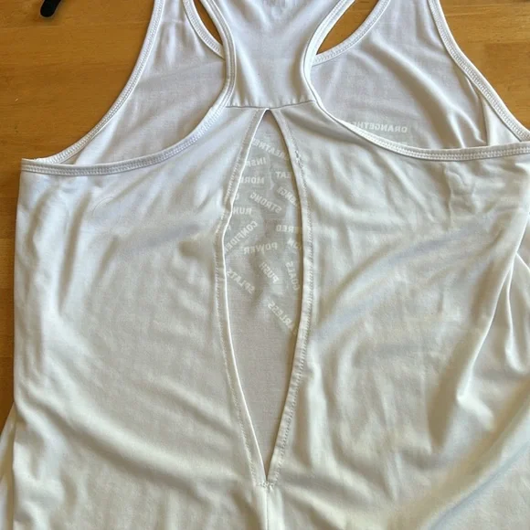 Orangetheory white tank with gold lettering and open slit in back - Picture 9 of 9